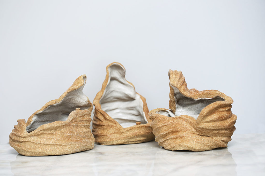 Gossipers Sculpture
